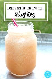 Pouring from a measuring cup, with the pan off the heat, add 1/4 cup rum. Deliciously Easy Banana Rum Punch Slushies For Summer