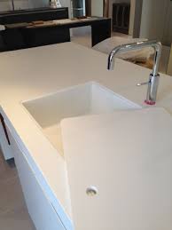 custom corian sink with sink cover