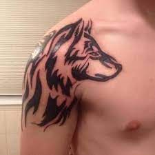 The 85 Best Wolf Tattoos For Men Improb Tribal Wolf Tattoo Wolf Tattoos Men Tribal Tattoos