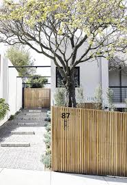 On The Level Create A Cohesive Look By Continuing Materials From Front To Back This Templeton Archi Architecture Exterior Australian Architecture Fence Design