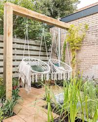 This diy pallet garden arbor bench with 3 carved hearts would be a beautiful addition to any backyard. 20 Relaxing Swing Garden Ideas In The Backyard Homemydesign