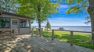 The east arm grand traverse bay real estate offers stunning waterfront views and accessibility to incredible recreational amenities. Michigan S Up North Cottage Market Is Red Hot Amid Pandemic Recession