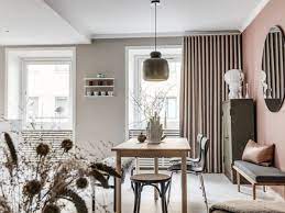 If you have room, scoot in a dressing table. Home Tour Ever Consider Pink Walls For The Living Room