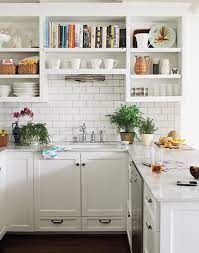 Replacing the doors involves taking off the existing doors, face frames and hardware while keeping the cabinet boxes where they are, and putting on new doors and face frames with the same hardware or new hardware. The Kitchn Kitchen Design Kitchen Remodel Kitchen Inspirations