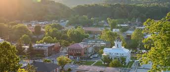 Riding to the top of the trail that allows bikes is very wide and a great leisurely ride with only a couple of short uphill sections. Road To Nowhere And Waterfalls In North Carolina S Great Smoky Mountains Visitnc Com