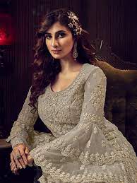 Alluring beauty of this dress will make you look classy and stylish when styled with stilettos and clutch. Soft Premium Net Party Wear Sarara In Beige Color With Embroidery Work Sharara