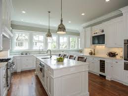 After removing the hardware, we recommend that the cabinets be thoroughly cleaned with a good cleaner degreaser to remove all grease and oils that normally buildup on kitchen cabinetry over time. Painting Kitchen Cabinets Antique White Hgtv Pictures Ideas Hgtv