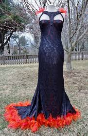 Pin By Brandy A Arnold On The Hunger Games Hunger Games Costume Fire Costume Katniss Costume