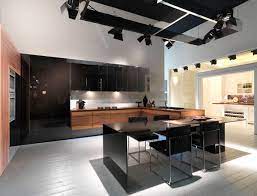 Photo of a contemporary kitchen in perth with an undermount sink, black cabinets, quartz benchtops, laminate floors, grey benchtop, flat. 15 Awesome Black Tan Kitchen Designs Home Design Lover