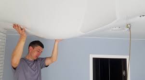 Repairing water damage on a plaster ceiling. How To Fix A Water Bubble In The Ceiling Combatwaterdamage Com