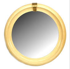 You can shop for antique wall mirrors based on their material types, such as wood, silver, and glass, or according to their shape and design, such as oval mirrors meant for wall hanging. Mid Century Modern Springer Round Wall Mirror 1rentplace