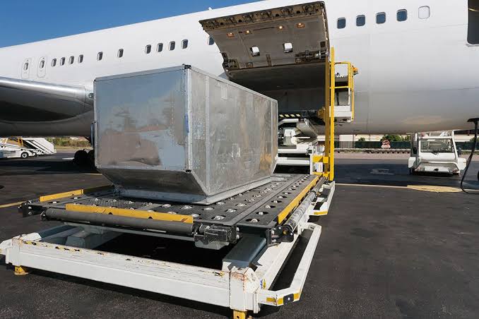 High-value cargo being securely handled and documented