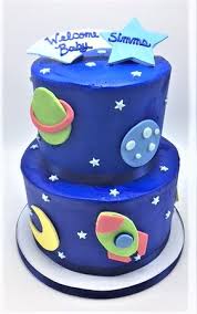 Boys birthday cakes can be created to reflect personality, sports, hobbies or a carrer. 2 Tier Space Themed Boy Baby Shower Cake By Flavor Cupcakery Picture Of Flavor Cupcakery Bake Shop Bel Air Tripadvisor