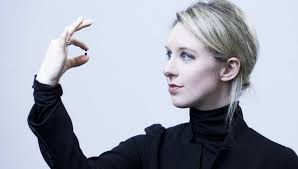Elizabeth holmes, founder and former chief executive officer of theranos inc., right, exits u.s. Theranos Founder Elizabeth Holmes Charged With Massive Fraud By Sec