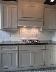 Shaker style cabinets countertops grey backsplash gray tile backsplash grey granite countertops backsplash kitchen white cabinets dark backsplash and countertop with grey cabinets. Grey Cabinets White Subway Tile And Black Granite Counter Top Trendy Kitchen Tile Grey Cabinets Black Granite Kitchen