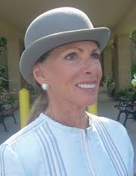 Ladies tip their hats to the holidays