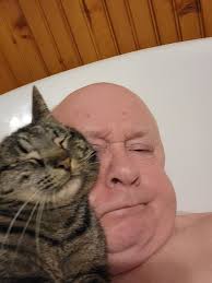 I am known for taking non-traditional routes for certain aspects of cat  rescue. I climb into the cage to tame feral cats, and I have also been  known to climb into the