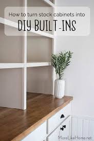 The shelves were cute but not very deep and didn't provide next we picked up some wood at home depot to create the spacers between the cabinets and two boards to create a top for the cabinetry. More Like Home How To Turn Stock Cabinets Into Diy Built In S