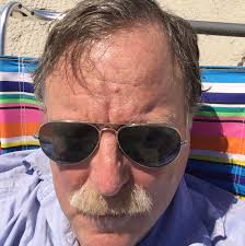 Why does Philadelphia struggle to preserve its old buildings?