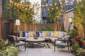 The wooden building comprises four tenant spaces. Tribeca Residential Rooftop Evan C Lai Landscape Design Inc Roof Terrace Design Rooftop Terrace Design Rooftop Design