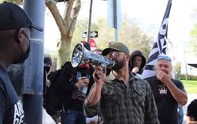 Leader of the proud boys group enrique tarrio has been sentenced to a total of 300 days in jail for bringing a rifle magazine into washington, dc and setting a black lives matter banner on fire outside. Florida Man Goes Fascist An Encounter With Enrique Tarrio The Nation
