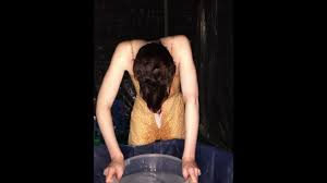 Naughty Jennifer does a Swirly Wedgie in a Bucket of Water