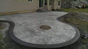First we tore out the existing asphalt and then graded to four inches. Hoffman Stamped Concrete Fractured Rock Texture Grey Charcoal With Charcoal Border