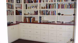 Decorate the four adjustable shelves and place dishes, blankets, or seasonal items on the two extra shelves hiding behind the two doors. Built In Filing Cabinets Painted Bookcase With File Drawers Below Senn S Custom Cabinets Bookcase Built In Bookcase Build Bookshelf