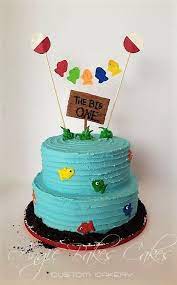 Whether your favorite is the cat in the hat or one fish, two fish, red fish, blue fish this cake would give the party a definite wow factor. The Big One Fishing Theme First Birthdays Fishing Birthday Party First Birthday Cakes