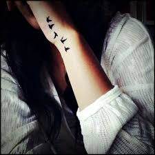 Attractive Simple Bird Tattoo On Hand 25 Attractive Rib Tattoo Designs Bird Tattoos For Women Tattoos Bird Tattoo Wrist