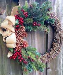 Winter Wreath Or Christmas Wreath Using Grapevine Red Berries Pine And Pine Cones With A T Christmas Wreaths Christmas Holidays Christmas Diy