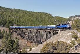 Montana Rail Link S Silver Cloud Business Train Crosses Skyline Trestle On Its Way Down Mullan Pass In To H Montana Road Trips Railroad Photography Train Rides
