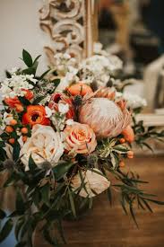 Choose from indoor luxurious faux flower arrangements and outdoor flowers. Wedding Flowers By Lancaster County Pennsylvania Florist Fetching Flora Orange Wedding Flowers Coral Wedding Flowers Wedding Flowers