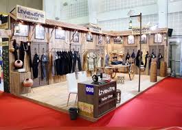Village Theme Garment Exhibition Stall Design And Fabrication At Ahmedabad Gujarat India Exhibition Stall Design Stall Designs Exhibition Stall