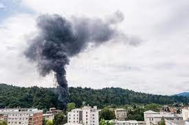 Column Of Black Smoke Rising Above Residential Buildings Column Of Black Smoke Sponsored Ad Paid Black Buildi Black Smoke Residential Building Photo
