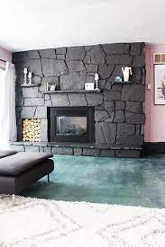 Find the perfect painted rock stock photos and editorial news pictures from getty images. Give An Old Fireplace New Life With A Modern Coat Of Paint Update Rock Or Bricks Easily And T Painted Rock Fireplaces Stone Fireplace Makeover Rock Fireplaces