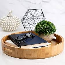 Start with a metal tray. Buy Decorative Coffee Table Tray By Coopers Grace Wooden Round Serving Tray For Living Room Round Wood Tray For Ottoman Or Side Table Charcuterie Board Or Cheese Platter Bamboo Coffee Tray Online