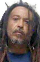 Man arrested after walking down road with a sawed-off shotgun