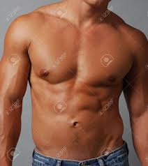 Muscles the dominant muscle in the upper chest is the pectoralis major. Closeup Of A Shirtless Muscular Male Torso Chest And Abdomen Stock Photo Picture And Royalty Free Image Image 12675816