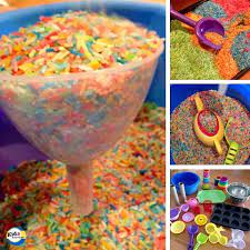 Sensory bin ideas for kidssensory bins are a great way to let kids play and explore! Rainbow Rice Sensory Play Using Sand Toys Kitchen Items Toddler Play Infant Activities Rainbow Rice