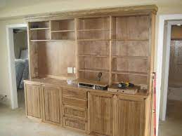 The most common material used in kitchen cabinetry today is wood. Custom Made Stained Poplar Media Center By Saw Tooth Designs Llc Custommade Com