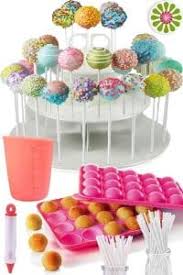 I put a little bit of cooking spray so they wouldn't stick. Cakes Of Eden Complete Cake Pop Maker Kit