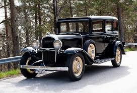 Image result for Garnet Maroon 1931 Oldsmobile