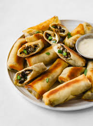 Working in several batches, fry the egg rolls, turning them occasionally, until they are a deep golden brown, about 4 to 6 minutes per batch. Vegan Mushroom Philly Cheesesteak Egg Rolls Daughter Of Seitan