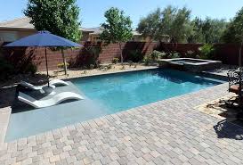 Custom Small Rectangular Pool With Raised Spa Tanning Ledge Loungers And Umbrella Artistic Pool Small Backyard Pools Pools Backyard Inground Rectangular Pool