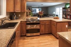 Now is a great time to renovate your kitchen! Birch Kitchen Cabinets Laminate Flooring Stainless Steel Double Oven Craftsman Kitchen Portland By Double J Construction Inc Houzz