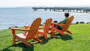 Maybe you would like to learn more about one of these? Woman Sitting In Orange Adirondack Chair Next To Mcnears Pier Adirondack Muskoka Chair Adirondak Chairs