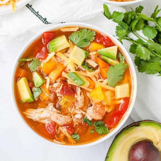 Warm and comforting low carb chicken fajita soup, AI generated
