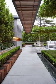 Traditional Patio By Nathan Burkett Design With Images Contemporary Garden Design Modern Landscaping Rooftop Garden