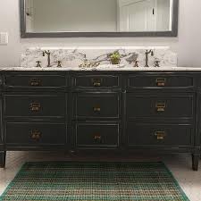 For a heritage bathroom look, opt for bathroom fixtures and fittings with detailed design, such as a claw foot freestanding bath, detailed freestanding or console basin and tapware inspired by english designs. Distressed Vintage Bathroom Vanity Design Ideas